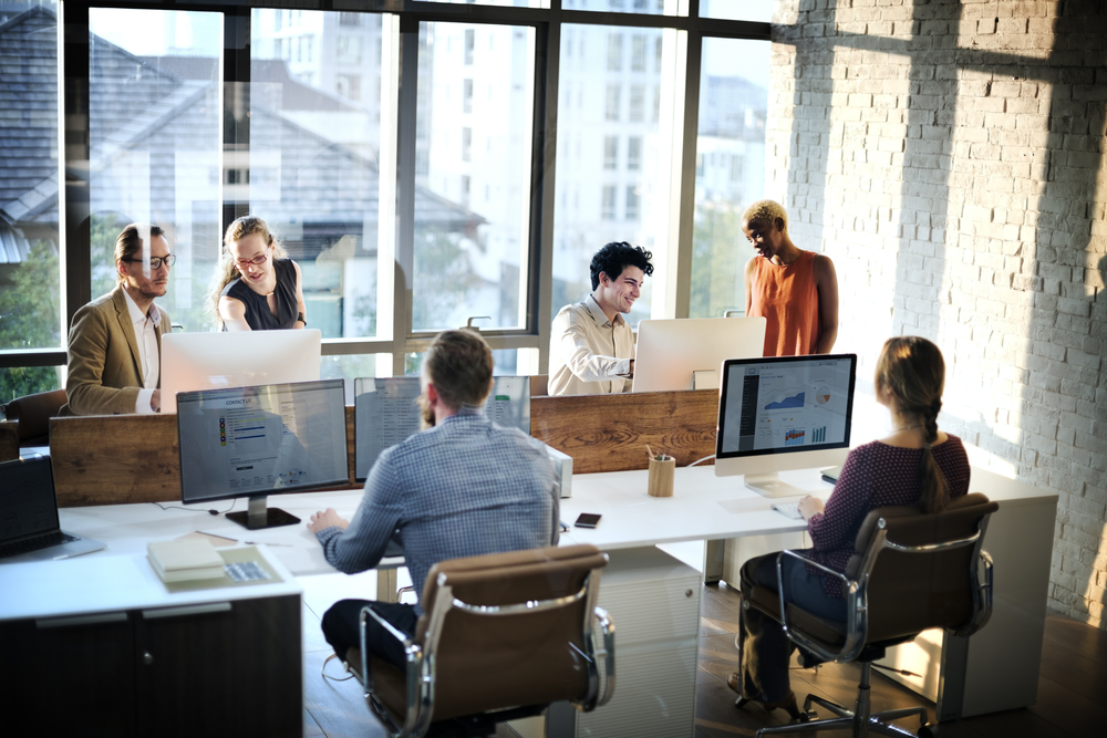 People sitting at computers in a room